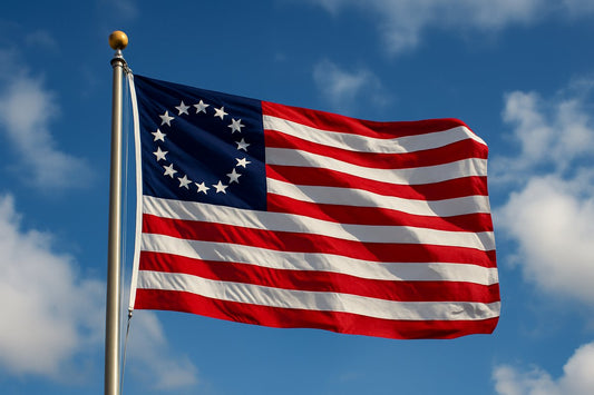 Historic Betsy Ross American flag flying high on Flag Day – patriotic symbol of the original 13 colonies.